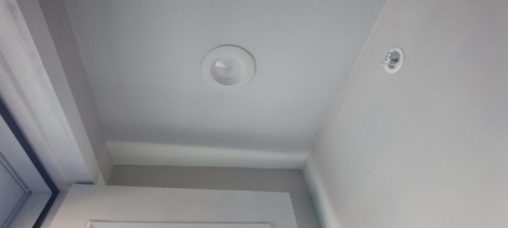Image of ceiling light after Dr Leaks repair with no water stain in sight