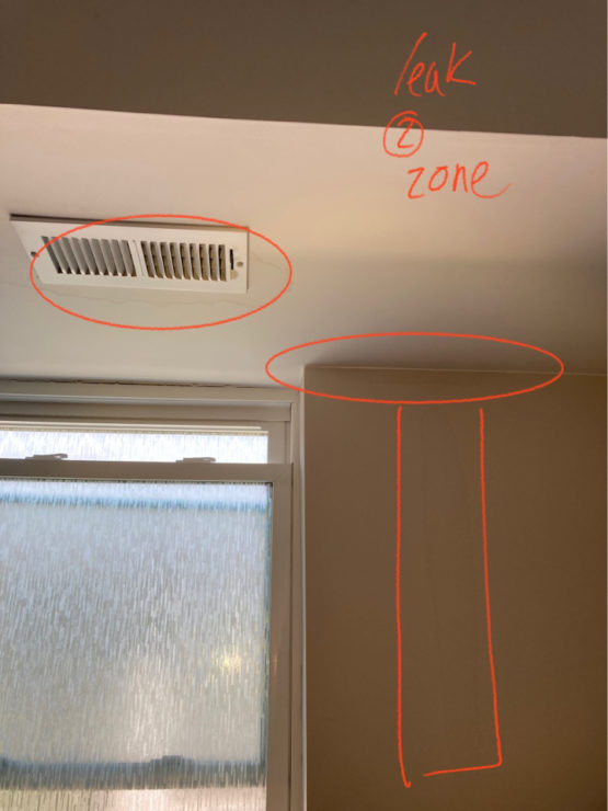 Image of home ceiling and wall with water damage as Dr Leaks technicians identify the source