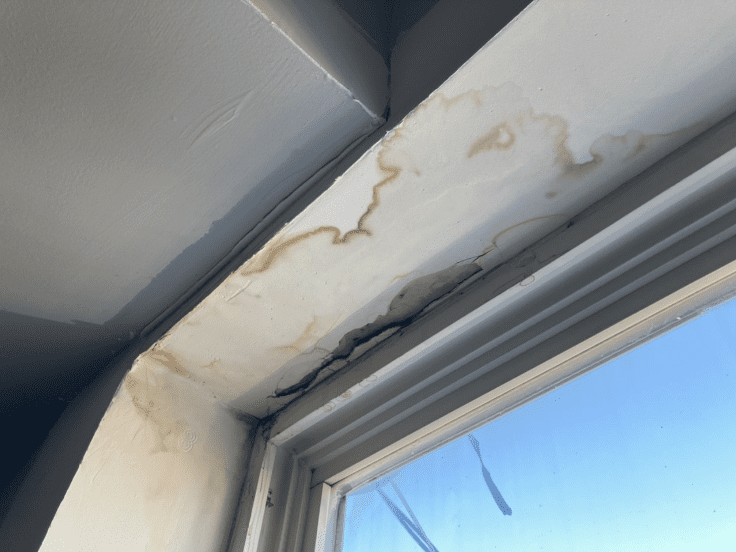 A photo showing a window leak, with significant water damage, taken by Dr. Leaks Philadelphia